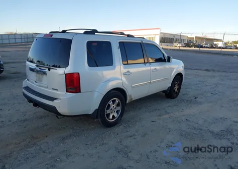 2011 Honda Pilot Touring z USA, uszkodzony, nr VIN 5FNYF3H99BB052009